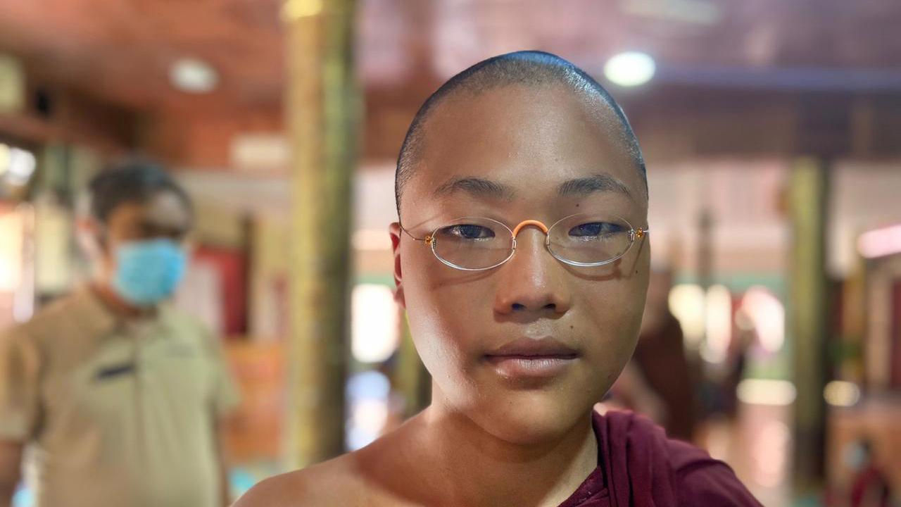 Young buddhist monk with GoodVision Glasses