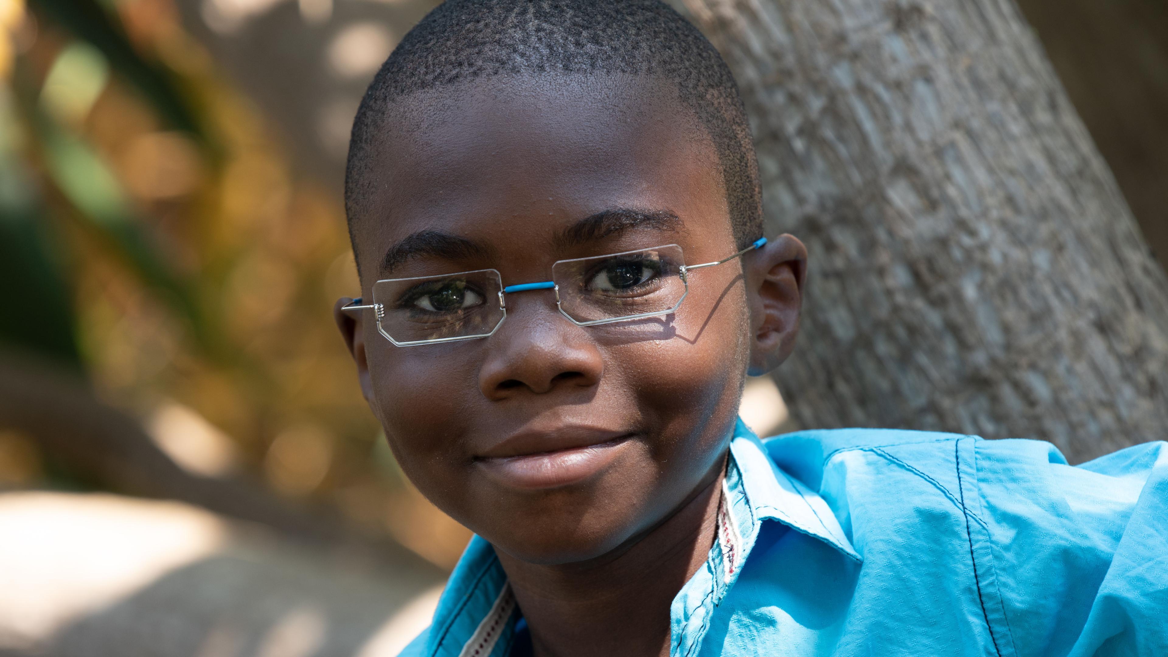Malawian boy with GoodVision Glasses and square lenses